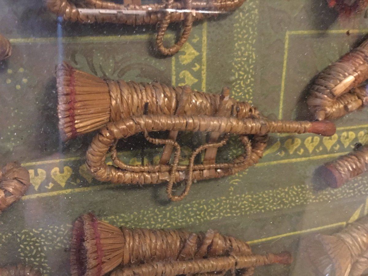 Curiosity . A Frame Containing Various Musical Instruments Made Of Straw And Rattan. Dated 1893-photo-2