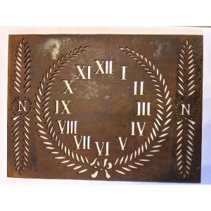 An Openwork Iron Plaque , Napoleonic Symbols And Roman Clock Dial Numbers