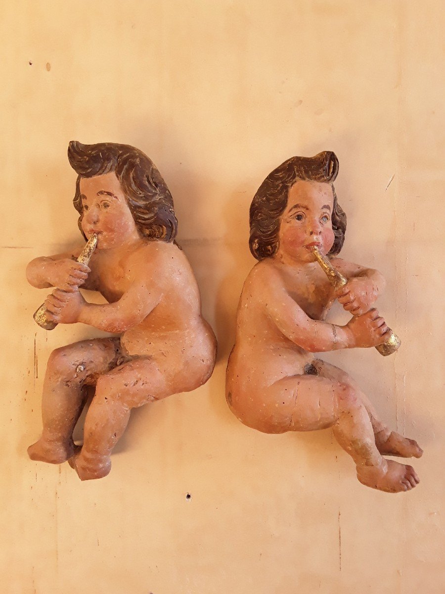 Pair Of Putti In Polychrome Wood. Height 59cm.