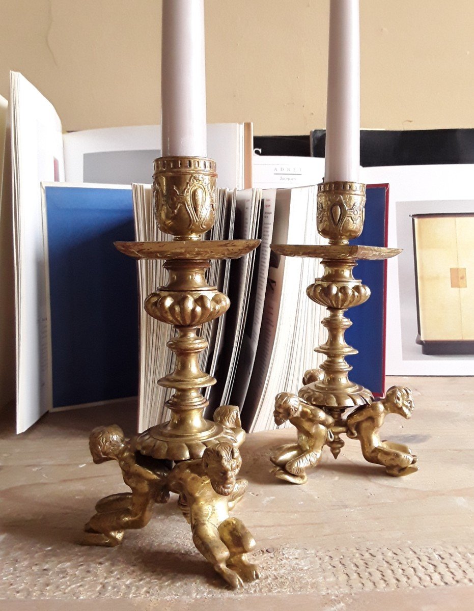 Pair Of “slave” Candlesticks.