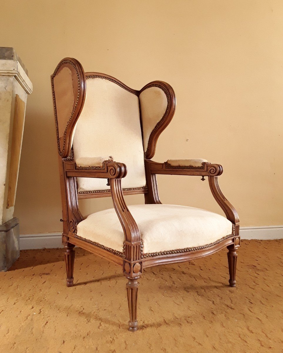 Important Fauteuil Louis XVI à Oreille Et Crémaillère. (circa 1820).