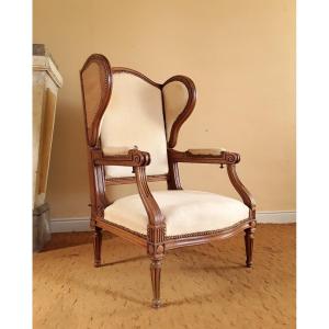 Important Louis XVI Armchair With Ear And Rack. (circa 1820).