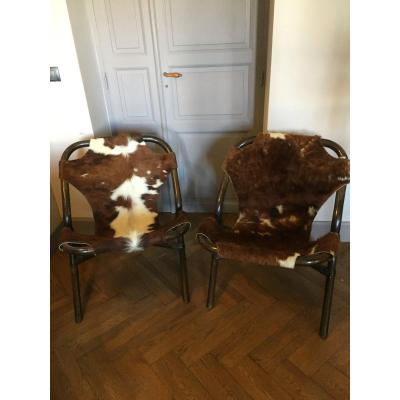 Pair Of Rattan And Cowhide Armchairs