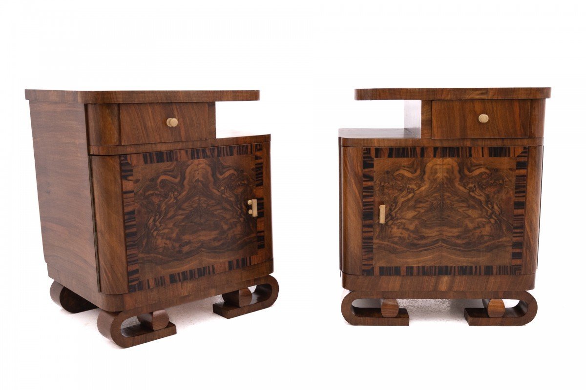 A Pair Of Art Deco Walnut Bedside Tables.