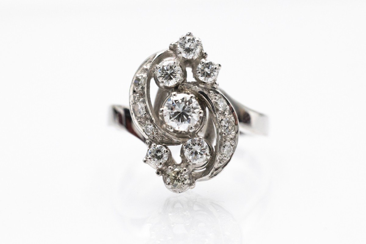 A Fancy Ring In White Gold With Diamonds