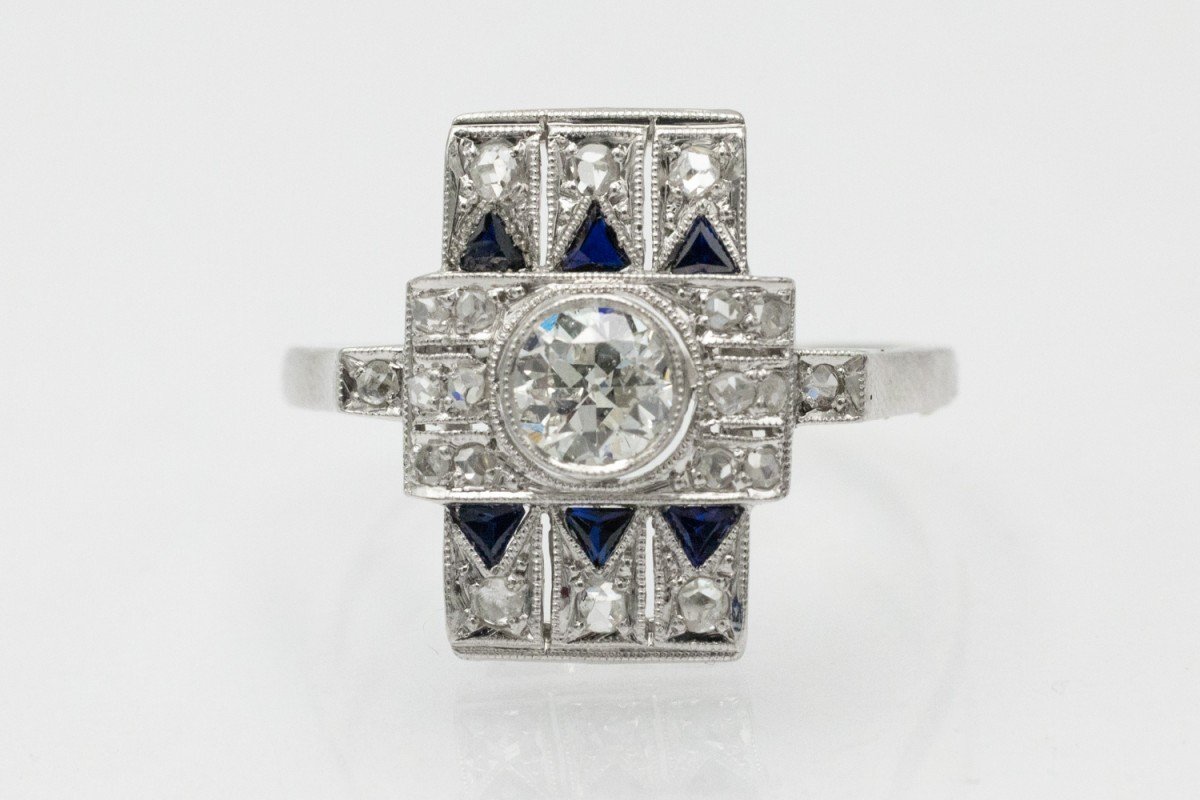 Geometric Ring With Diamonds And Sapphires In Art Deco Style.