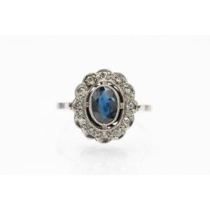 Antique Classic Platinum Ring With Sapphire And Diamonds.