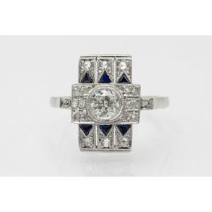 Geometric Ring With Diamonds And Sapphires In Art Deco Style.