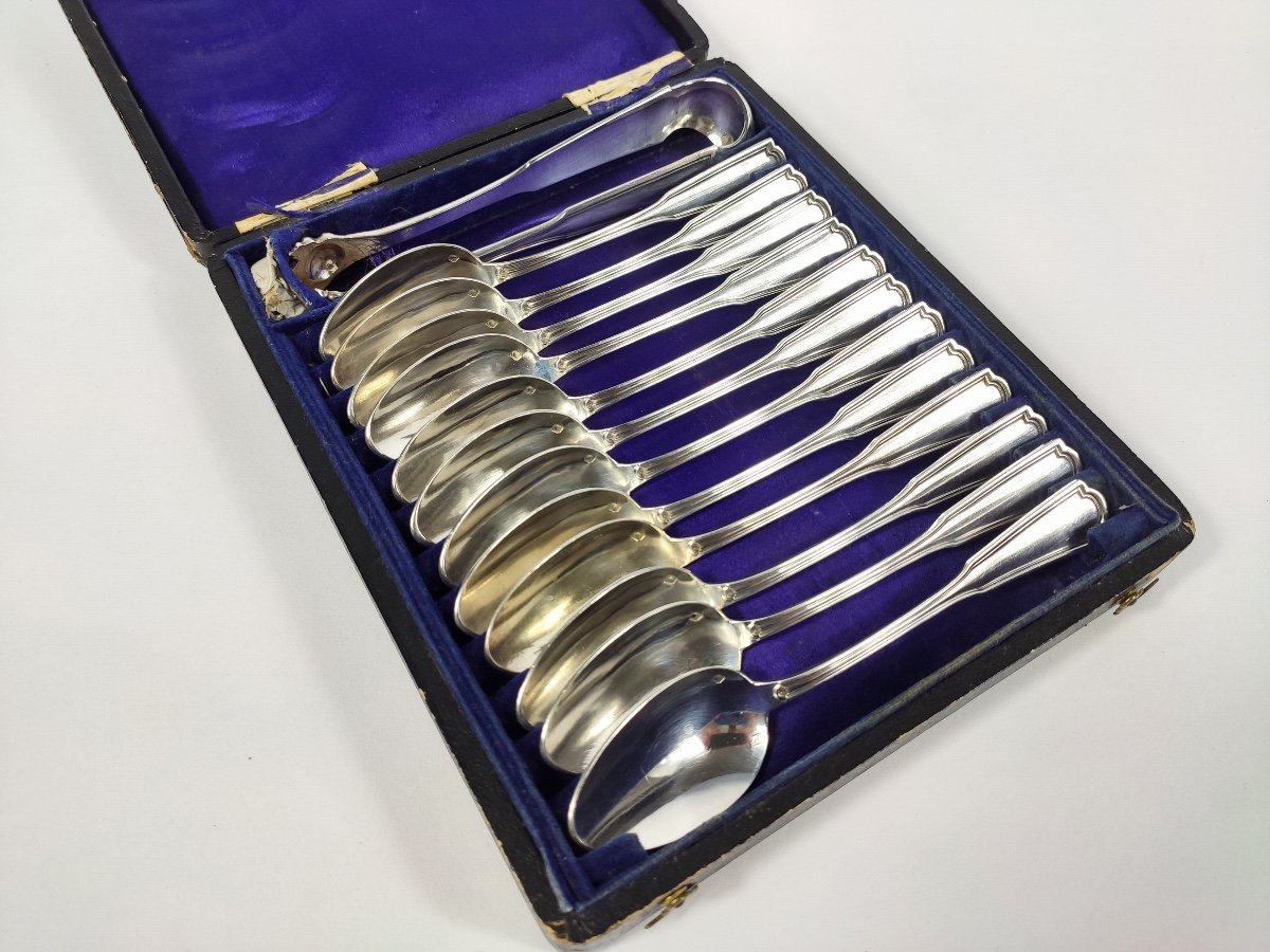 Queillé: Solid Silver Tea Set: 12 Spoons & Sugar Tongs. 19th Century. 