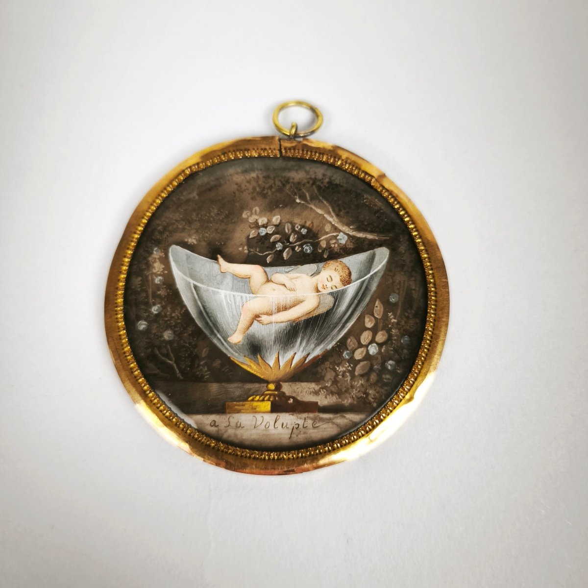  A La Volupté: Romantic Allegorical Miniature Of A Putto Sleeping In A Cup. Gold And Metal