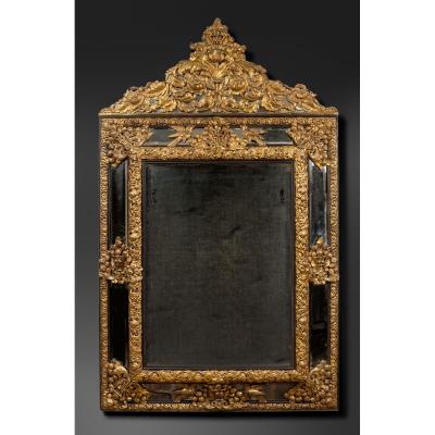 Monumental Mirror In Golden And Repousse Copper With Ebony Framing.