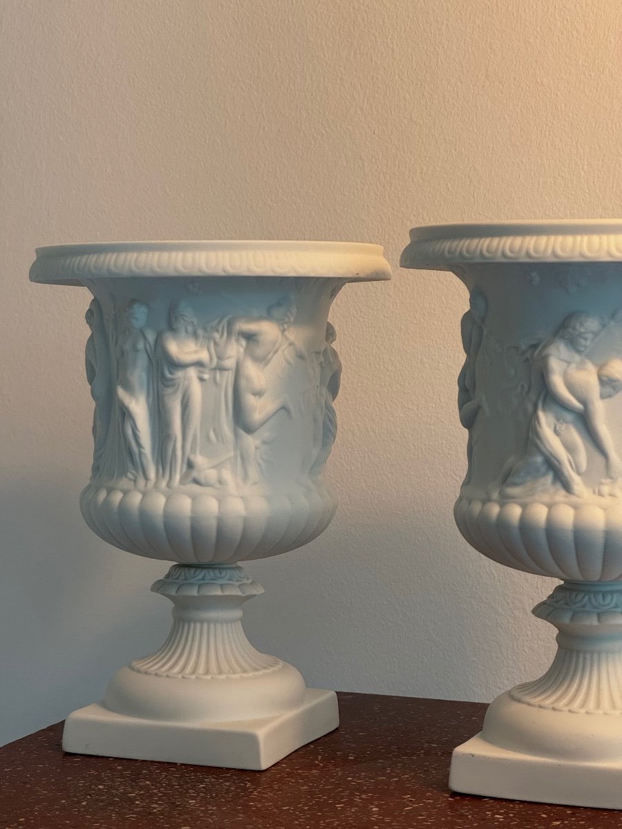 Pair Of Medici Vases Candle Handlers In White Biscuit With Relief Decor Of Antique Scenes-photo-2