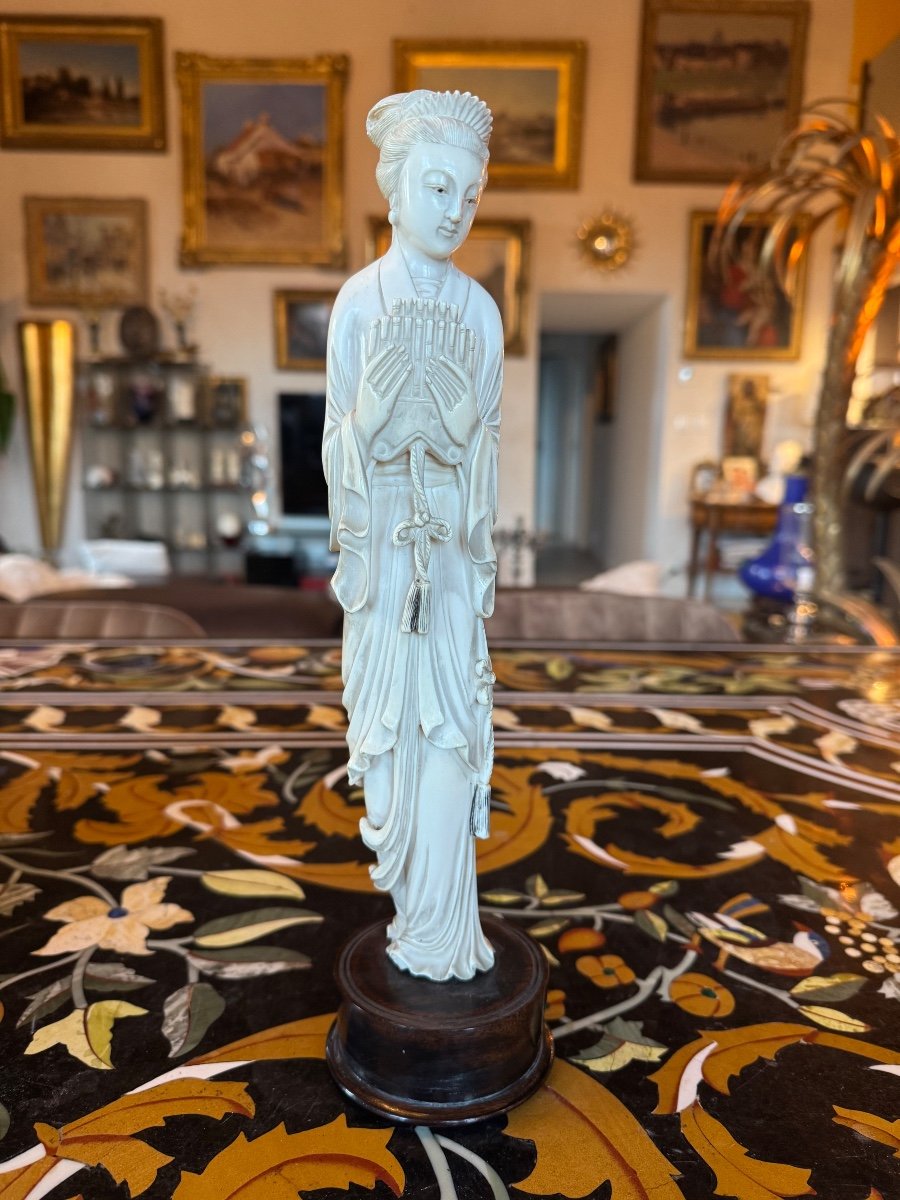 19th Century Ivory Okimono Depicting A Woman Playing A Flute