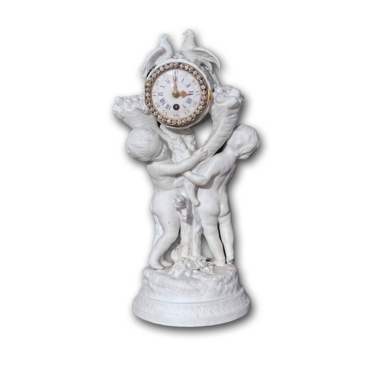 HORLOGE EN PORCELAINE FRANÇAISE DÉBUT 19ème SIÈCLE