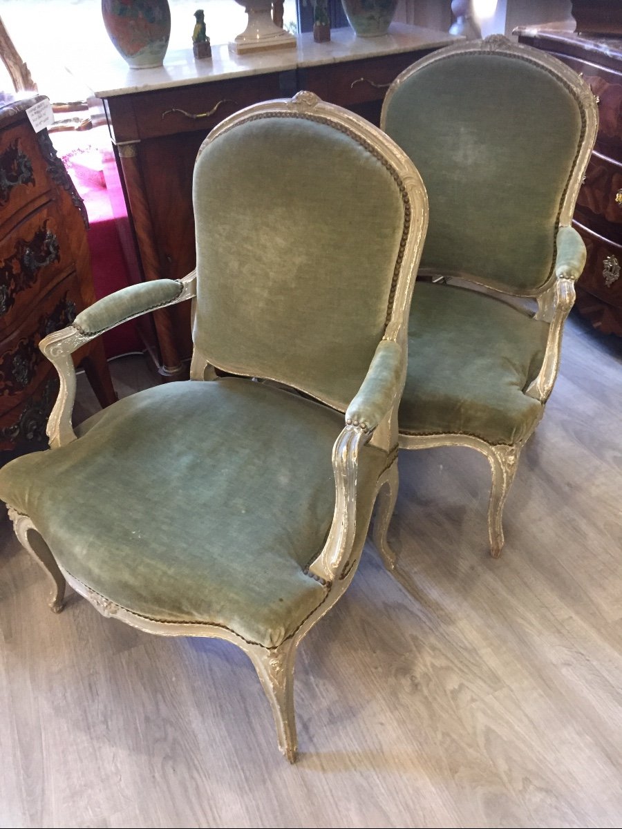 Pair Of Louis XV Rechampis Armchairs. Model à La Reine 