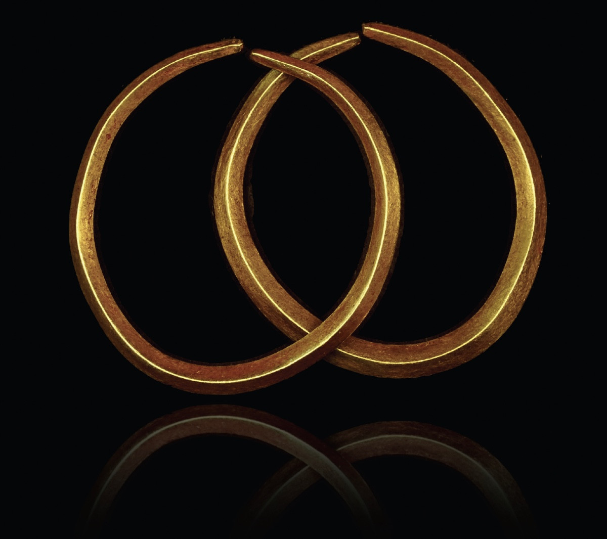  Pair Of Gold Penannular Earrings. Bronze Age.