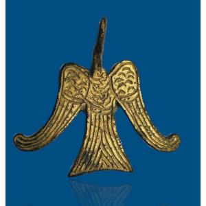 Objet zoomorphe médiéval: oiseau. Pendentif 15e