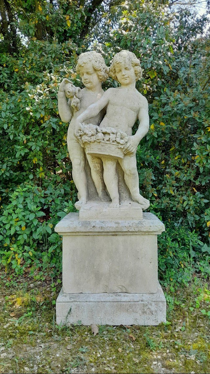 Statue chérubins à la corbeille de fleurs