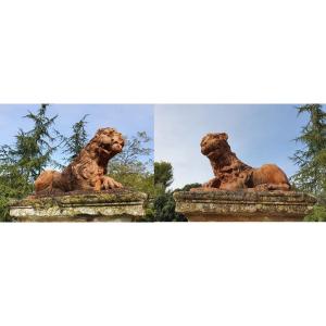 Pair Of Lying Lions In Terracotta