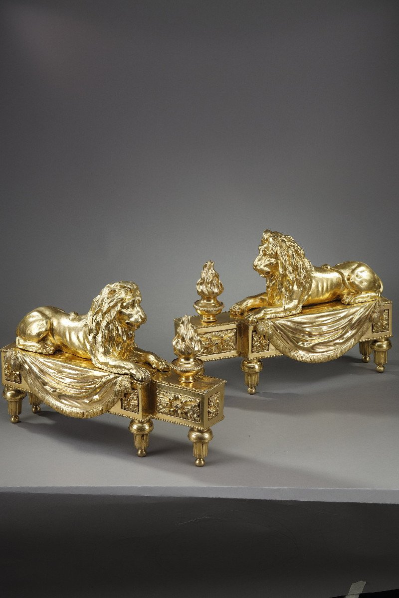 Pair Of Andirons With Lions In Chiseled And Gilded Bronze