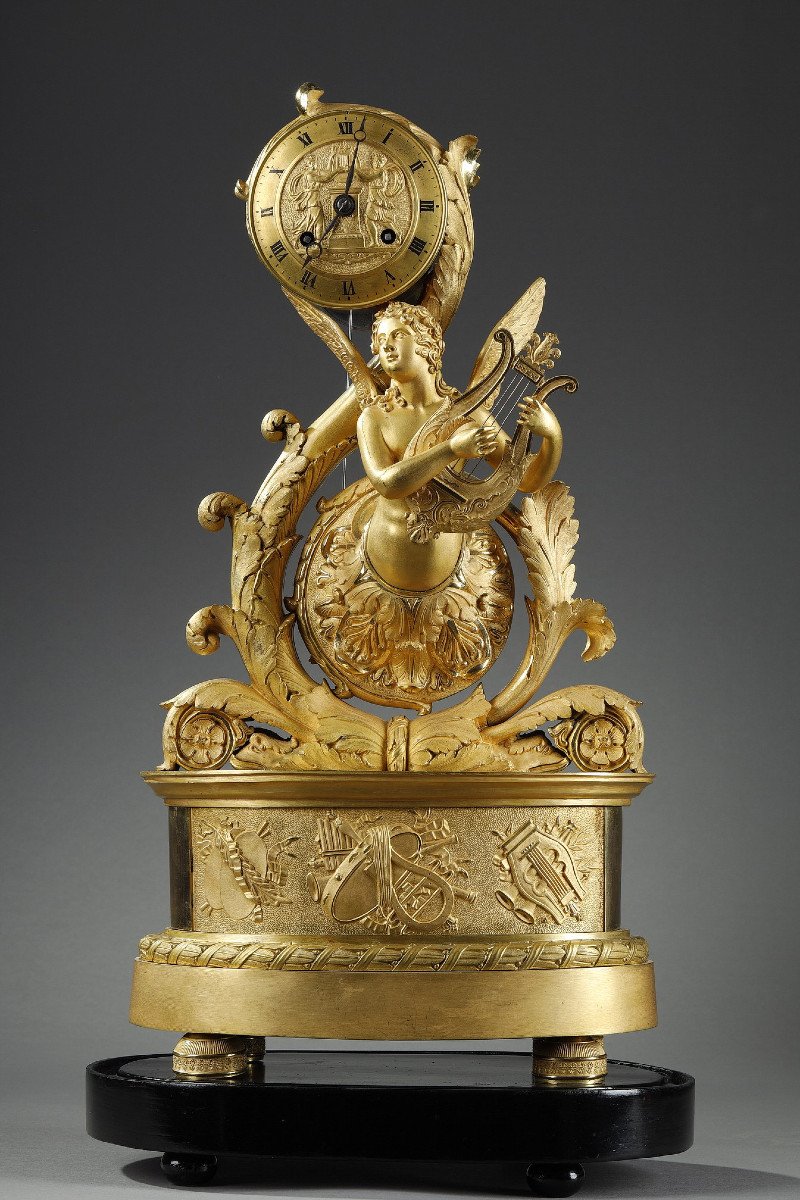 Winged Genius Clock In Gilt Bronze, Charles X Period