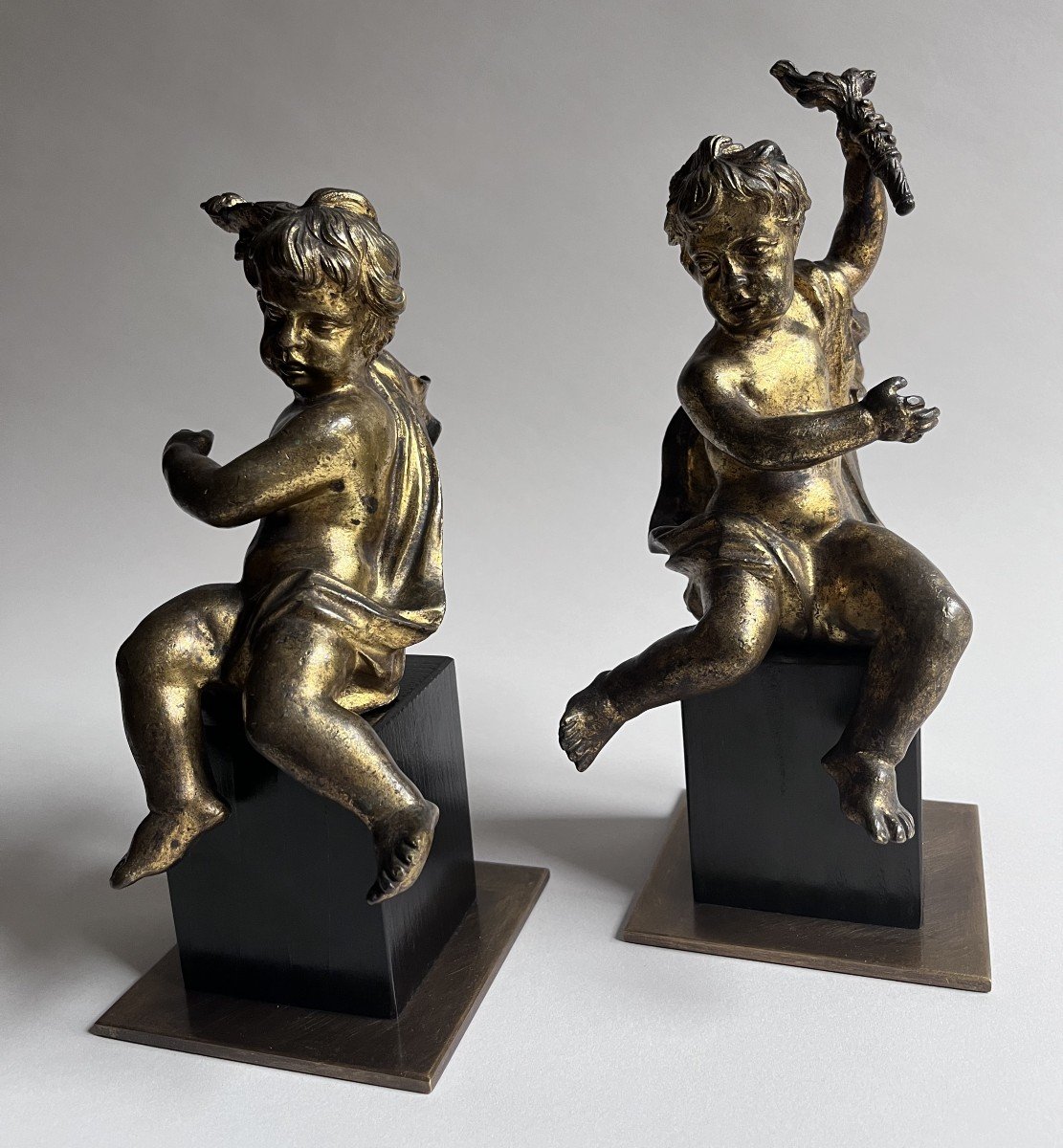 Pair Of Putti In Gilt Bronze