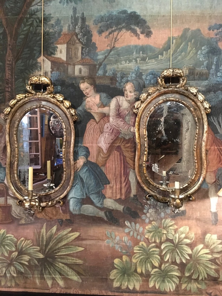 Pair Of Italian Mirrors In Carved Wood 18th With Their Arm Of Light And Their Silvering