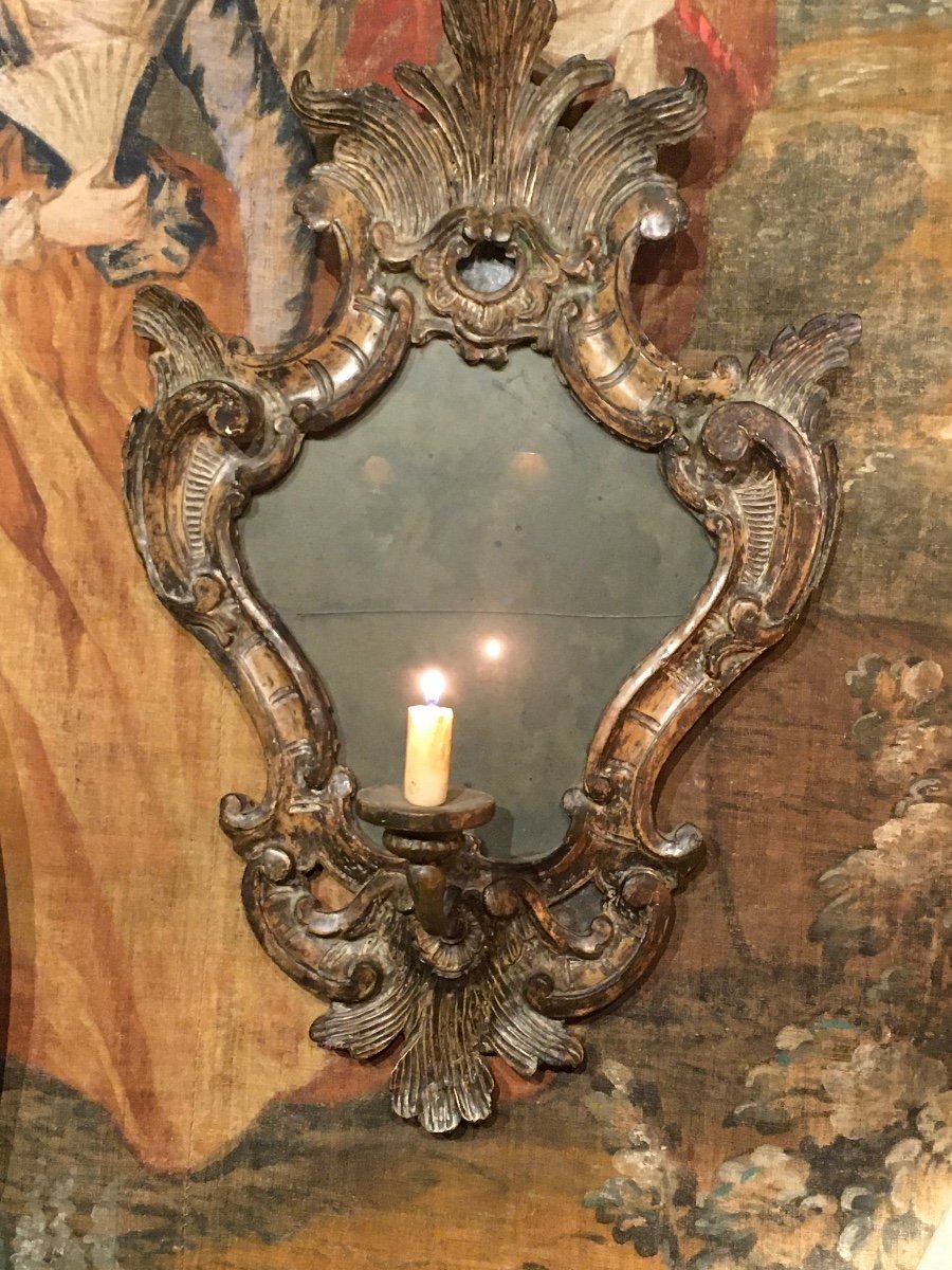 Pair Of Regency Period Venetian Silvered Wood Mirrors With A Light Arm 