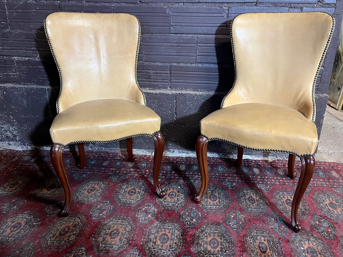 Two Chippendale Low Chairs In Thick Leather