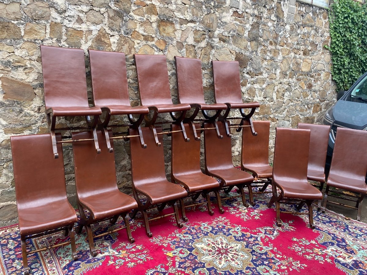 Suite Of Fourteen Chairs Covered In Leather Maison Valenti