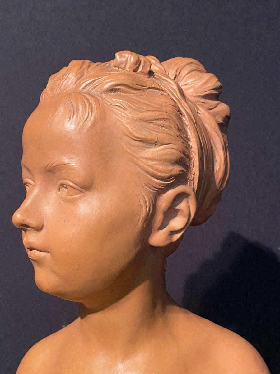 Bust Of Young Boy In Terracotta-photo-2