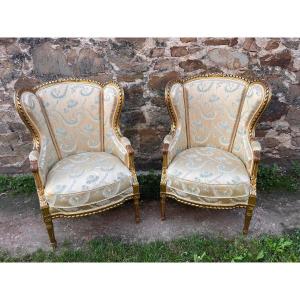 Pair Of Louis XVI Style Bergeres With Ears In Golden Wood 