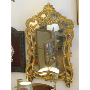 Miroir à parecloses en bois sculpté et doré  ,  (Hauteur 85 cm )  XIX ème
