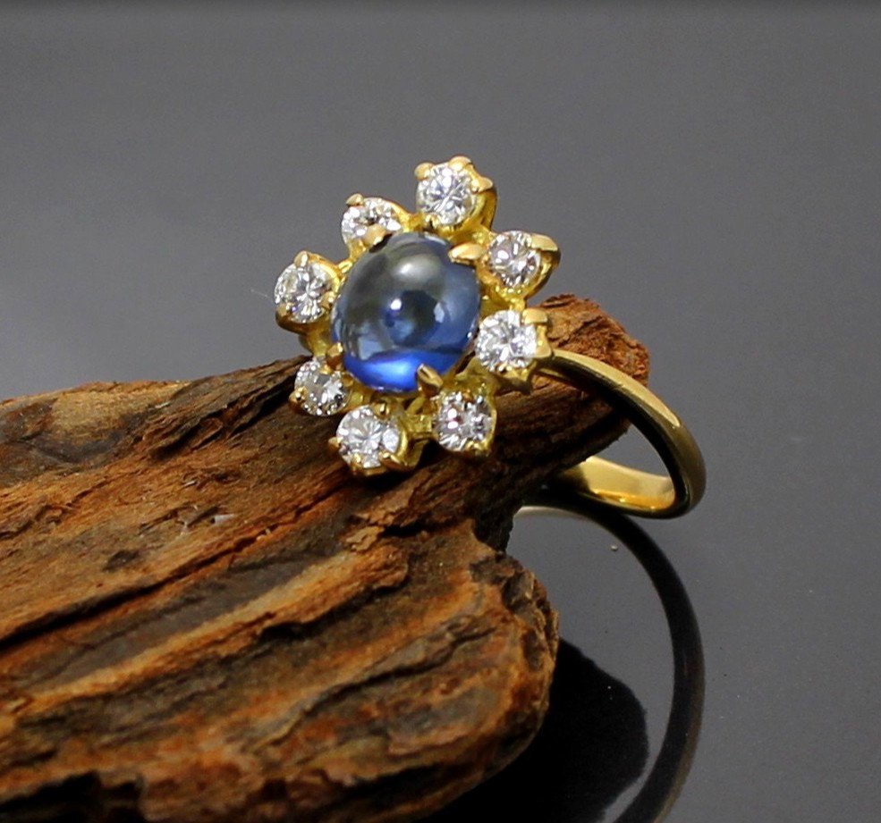 Gold, Sapphire And Diamond Ring