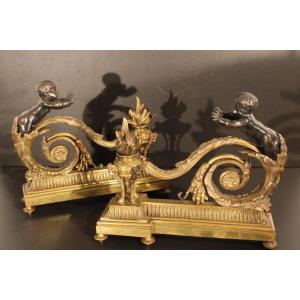 Pair Of Andirons With Angels In Bronze