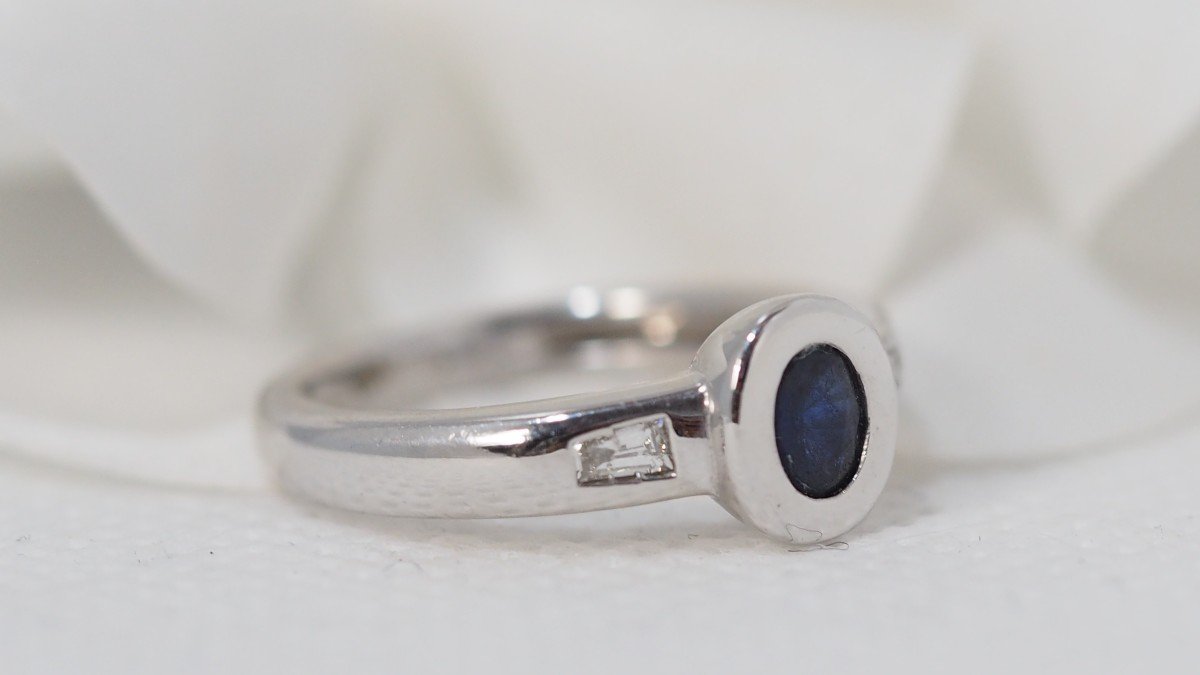 White Gold Ring Set With An Oval Sapphire And Diamonds-photo-3