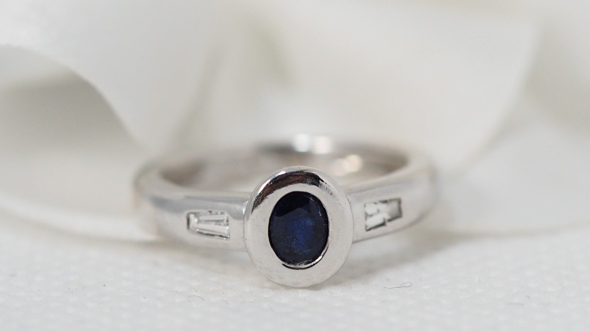 White Gold Ring Set With An Oval Sapphire And Diamonds-photo-1