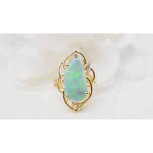 Openwork Ring In Yellow Gold And Australian Opal