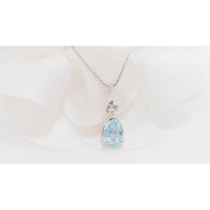 White Gold And Blue Topaz Solitaire Necklace