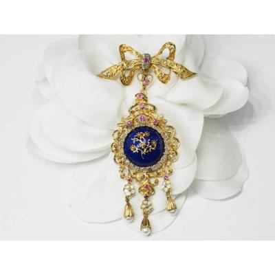 Broche pendentif en or jaune, rubis et perles