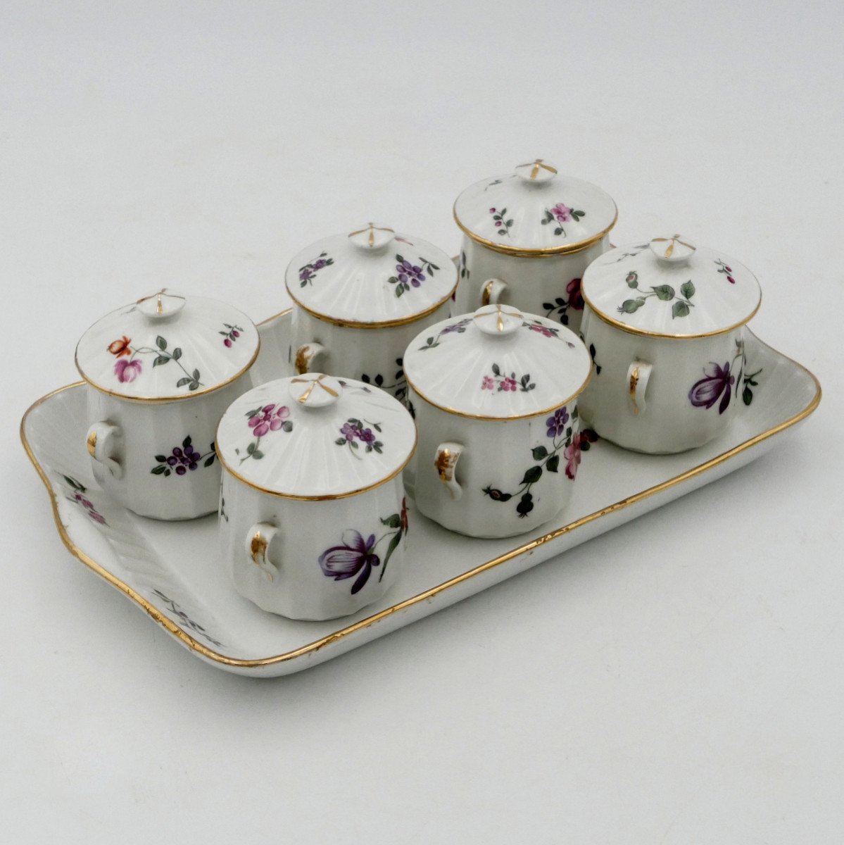 Six Covered Cream Pots And Tray In Polychrome Porcelain, Circa 1900.-photo-2