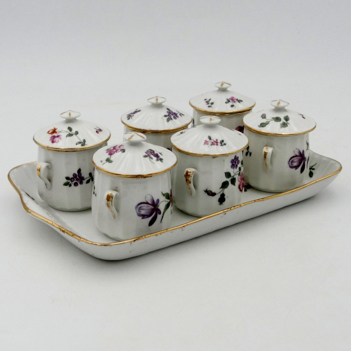 Six Covered Cream Pots And Tray In Polychrome Porcelain, Circa 1900.-photo-3