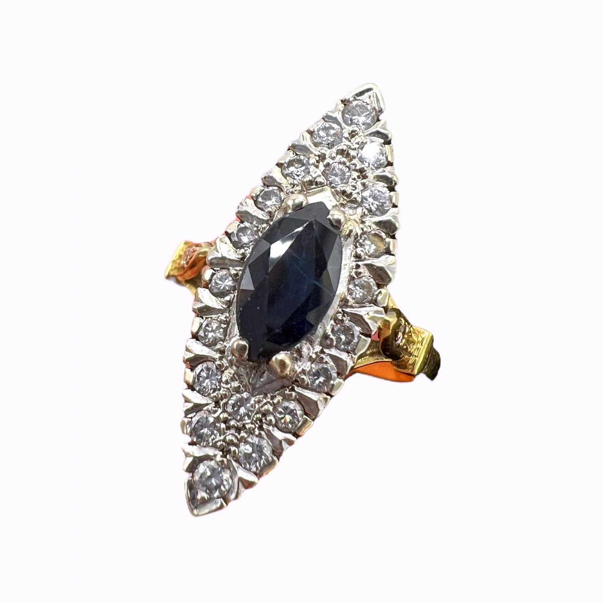 "marquise" Ring In 18 Carat Gold Set With A 0.95 Ct Sapphire Surrounded By A Pavé Of Diamonds