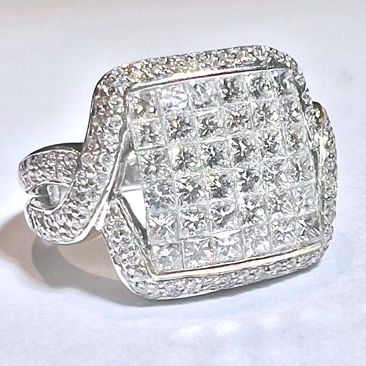 White Gold Ring With Princess Diamonds And Diamond Paving