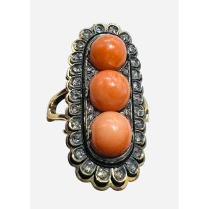 18 Carat Gold Ring Set With 3 Coral Beads And Antique Cut Diamonds Enhanced With Black Enamel