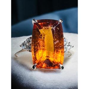 18 Carat Gold Ring Set With A 6.40 Ct Spessartite Garnet And 6 Diamonds