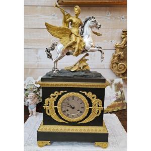 Terminal Pendulum In Gilt Bronze Topped With A Fame Riding Pegasus.