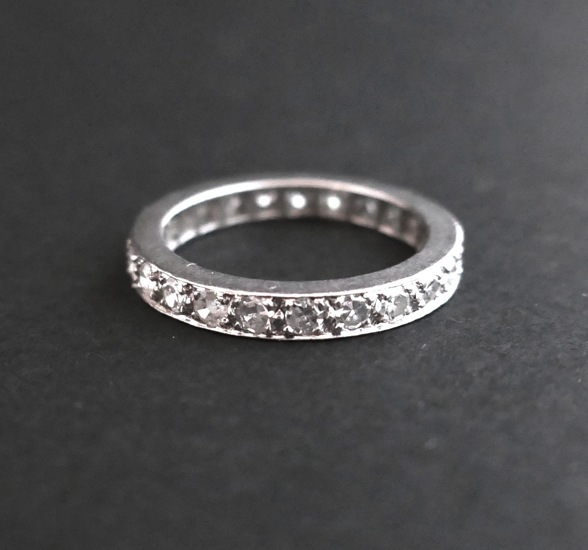 Small Platinum And Diamond Wedding Ring.