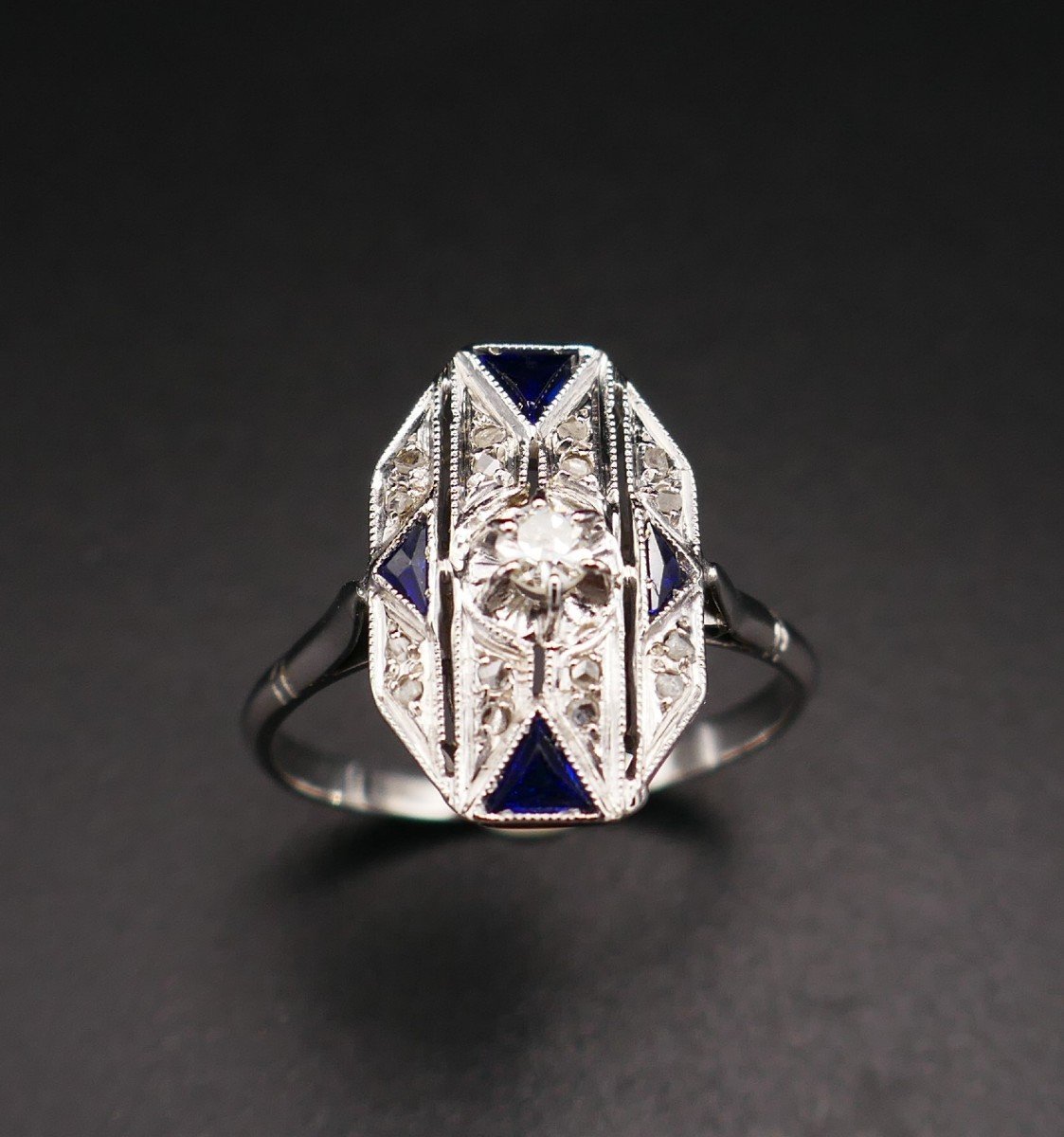 Art Deco Ring With Calibrated Diamonds And Sapphires, 18 Carat White Gold.