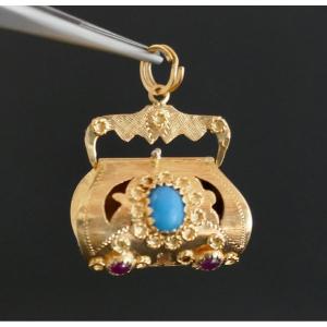 Important Ruby And Turquoise Charm Pendant.